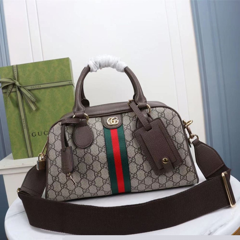 G*u*i top handle bags